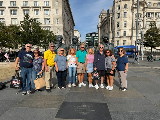 A recent Group from the Cruise Ship at The Beatles Statues for their Cruise Beatles Tour